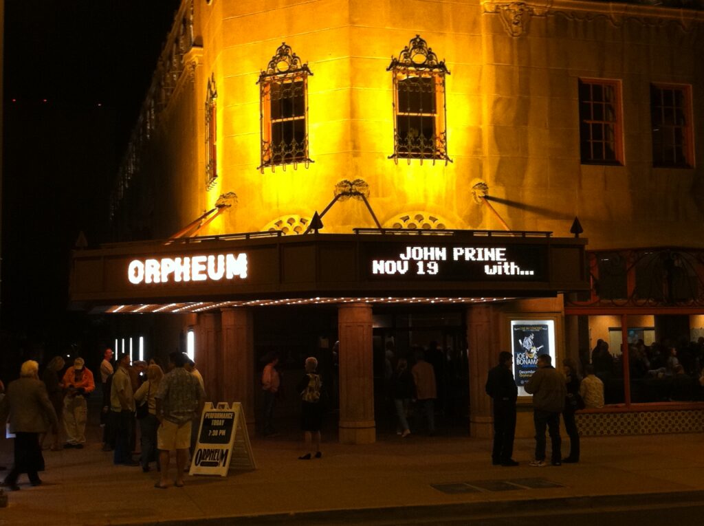 photo of the orpheum theater in phoenix arizona with john prine on the marquee